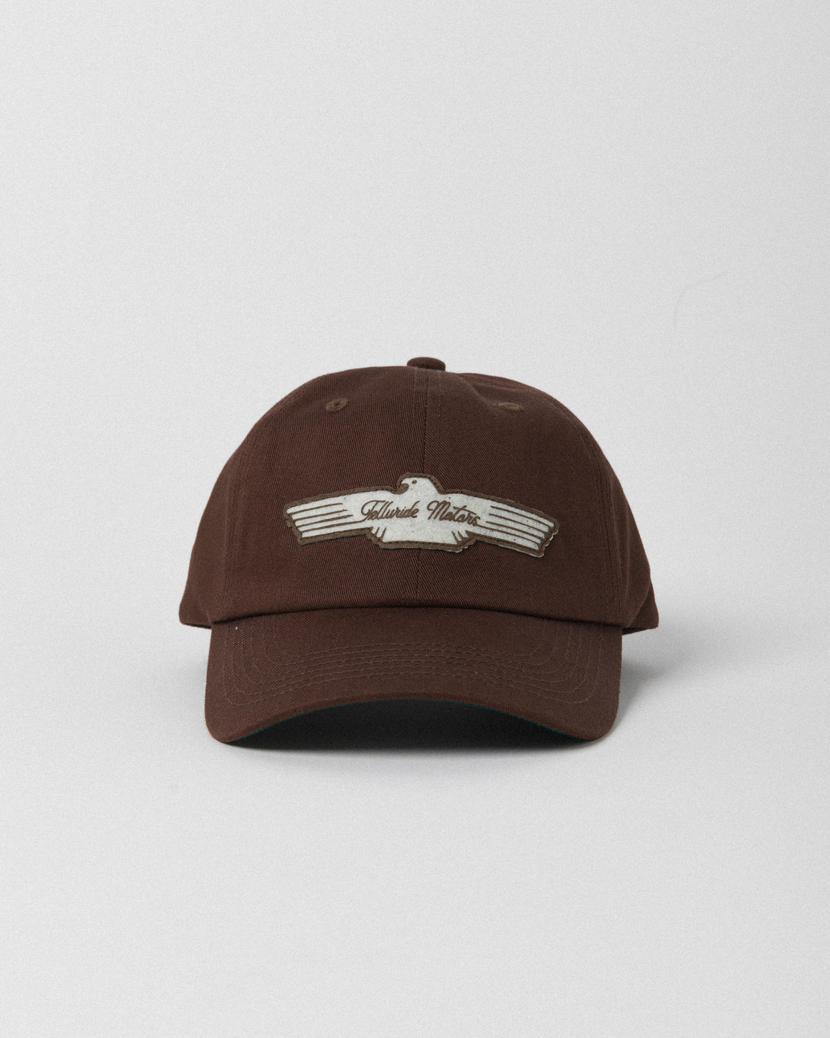 Telluride Motor Cap — Rust — front view